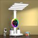 Настільна лампа KRX-104 LED з RGB-підсвіткою, вентилятором, годинником і органайзером &bull; Акумуляторний світильник 4 в 1 з 4 плафонами, сенсорним керуванням і дисплеєм для роботи, навчання та дому